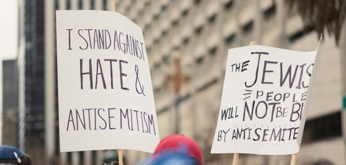 antisemitism signs from a protest